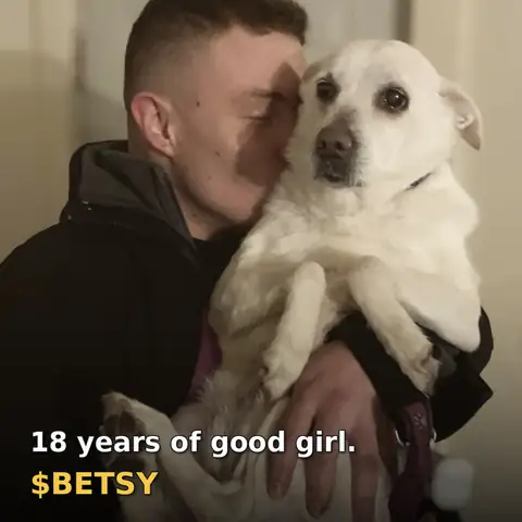 Zech hugging Betsy: 18 years of good girl